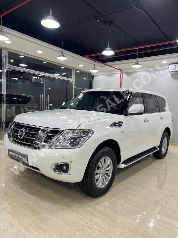 Nissan  Patrol  SE  2015  Automatic  234,000 Km  8 Cylinder  Four Wheel Drive (4WD)  SUV  White