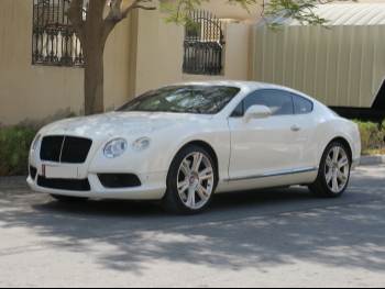 Bentley  Continental  GT  2014  Automatic  75,000 Km  8 Cylinder  All Wheel Drive (AWD)  Coupe / Sport  White