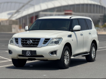 Nissan  Patrol  SE  2015  Automatic  314,000 Km  8 Cylinder  Four Wheel Drive (4WD)  SUV  White