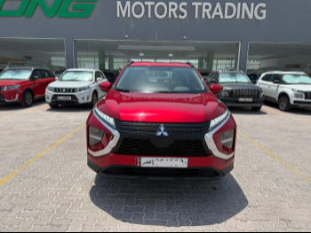 Mitsubishi  Eclipse  2022  Automatic  58,000 Km  4 Cylinder  Front Wheel Drive (FWD)  SUV  Red