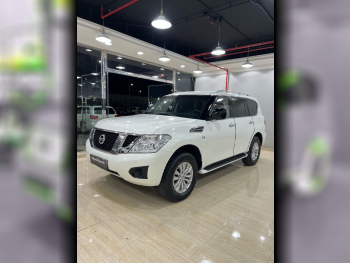 Nissan  Patrol  SE  2016  Automatic  194,000 Km  8 Cylinder  Four Wheel Drive (4WD)  SUV  White  With Warranty
