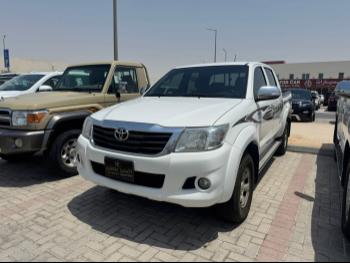 Toyota  Hilux  2014  Automatic  170,000 Km  4 Cylinder  Four Wheel Drive (4WD)  Pick Up  White