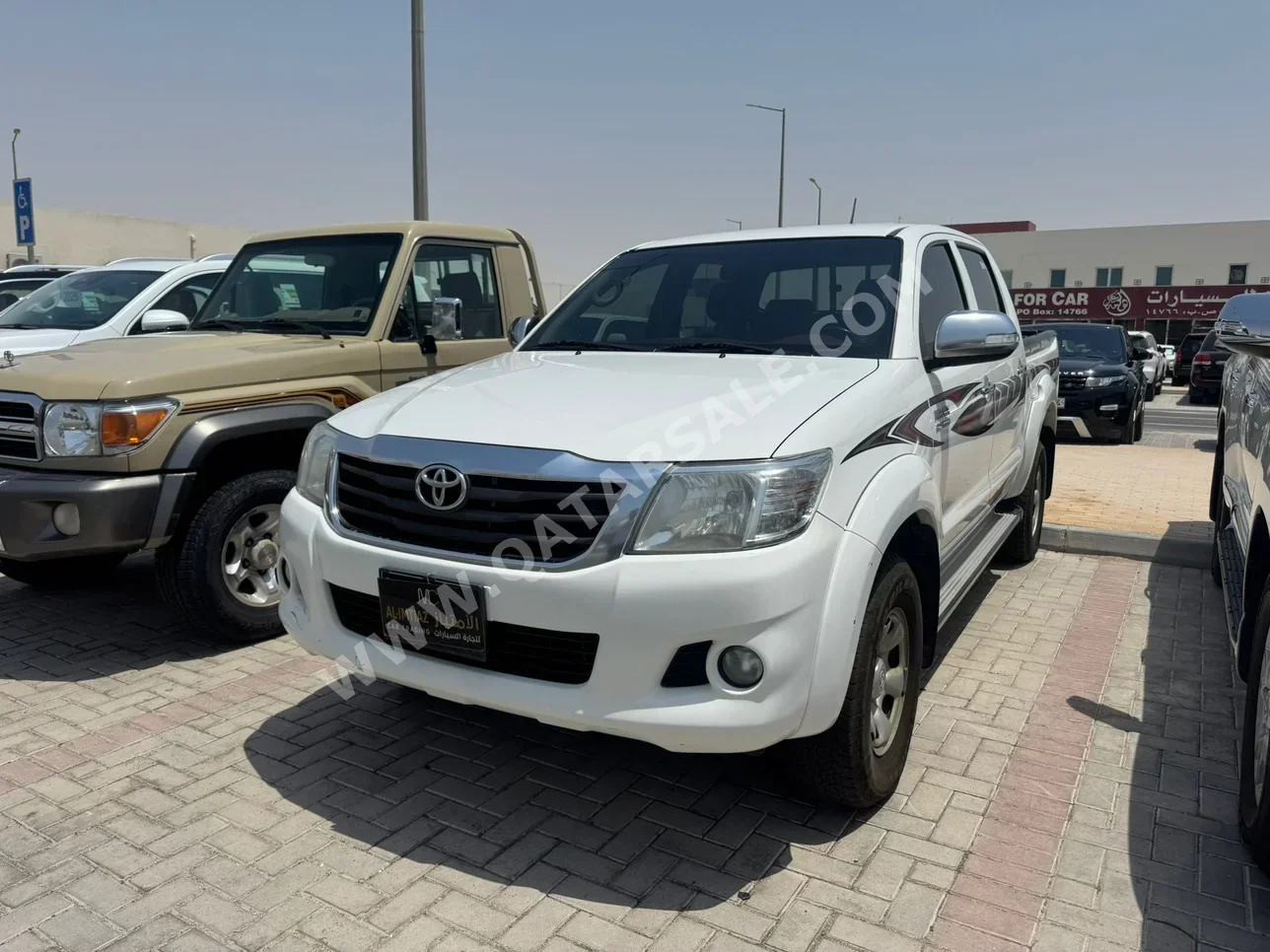 Toyota  Hilux  2014  Automatic  170,000 Km  4 Cylinder  Four Wheel Drive (4WD)  Pick Up  White