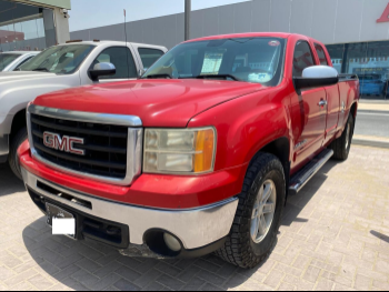 GMC  Sierra  1500  2009  Automatic  487,000 Km  8 Cylinder  Four Wheel Drive (4WD)  Pick Up  Red