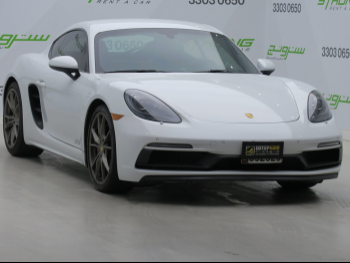 Porsche  Cayman  718 GTS  2018  Manual  56,000 Km  4 Cylinder  Rear Wheel Drive (RWD)  Coupe / Sport  White
