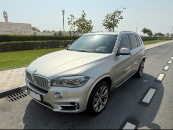 BMW  X-Series  X5  2014  Automatic  106,000 Km  8 Cylinder  All Wheel Drive (AWD)  SUV  Silver