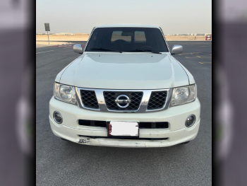 Nissan  Patrol  Super Safari  2006  Automatic  395,000 Km  6 Cylinder  Four Wheel Drive (4WD)  SUV  White