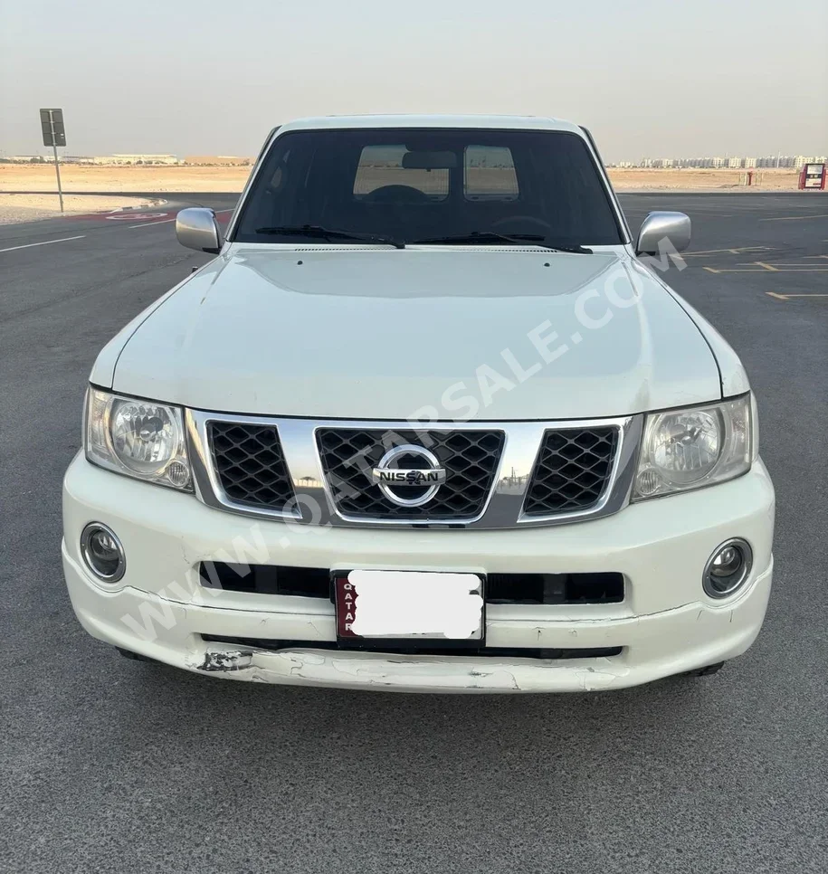 Nissan  Patrol  Super Safari  2006  Automatic  395,000 Km  6 Cylinder  Four Wheel Drive (4WD)  SUV  White