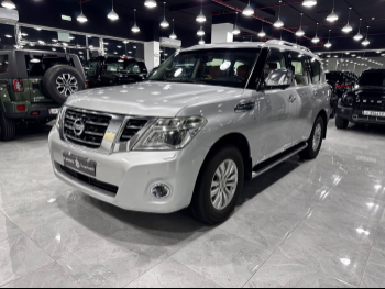 Nissan  Patrol  Platinum  2014  Automatic  221,000 Km  8 Cylinder  Four Wheel Drive (4WD)  SUV  Silver