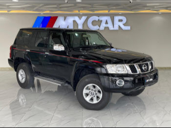 Nissan  Patrol  Safari  2024  Manual  30,000 Km  6 Cylinder  Four Wheel Drive (4WD)  SUV  Black  With Warranty
