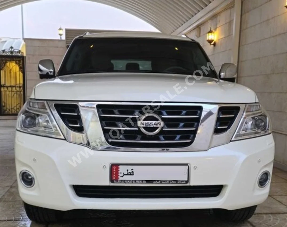 Nissan  Patrol  Platinum  2016  Automatic  196,000 Km  8 Cylinder  Four Wheel Drive (4WD)  SUV  White