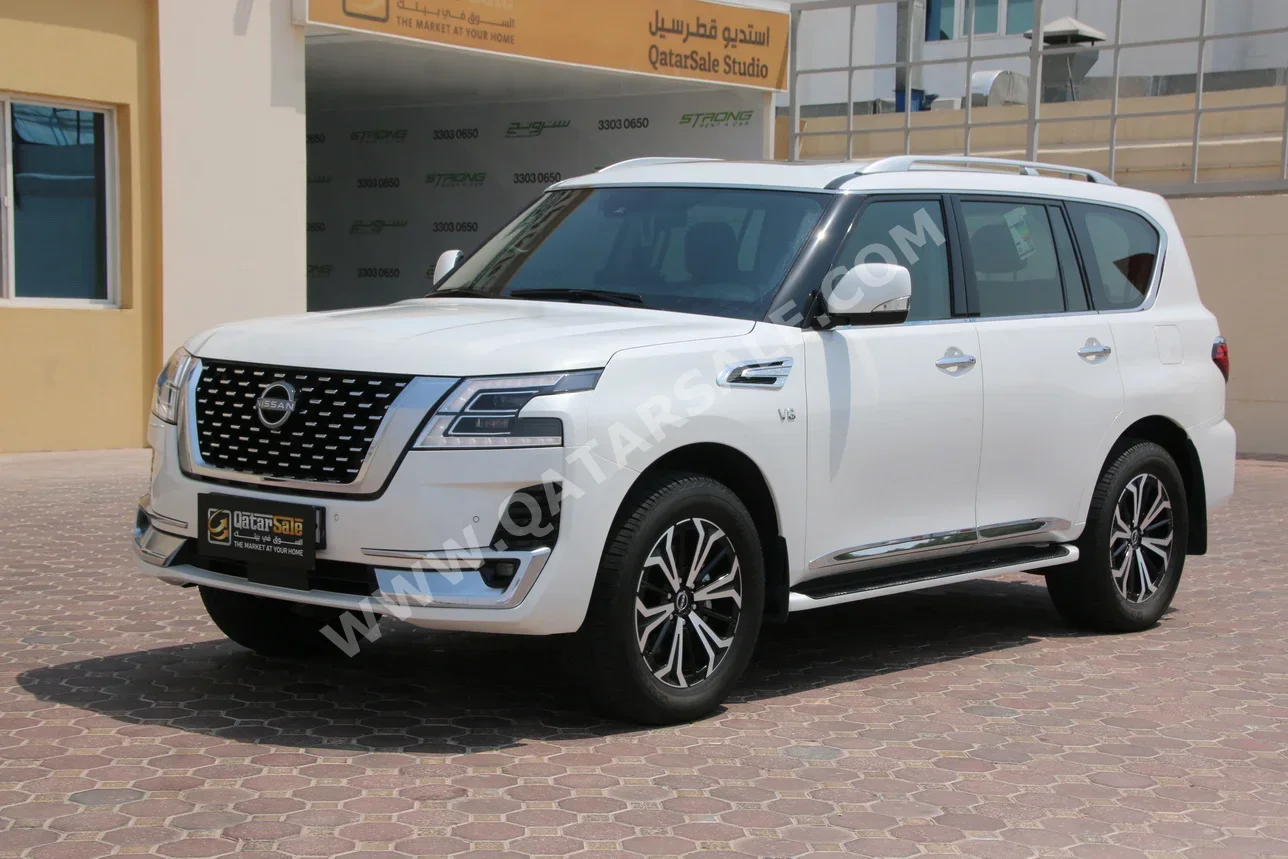 Nissan  Patrol  Titanium  2023  Automatic  26,000 Km  8 Cylinder  Four Wheel Drive (4WD)  SUV  White  With Warranty