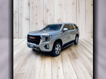 GMC  Yukon  SLE  2023  Automatic  900 Km  8 Cylinder  Rear Wheel Drive (RWD)  SUV  Dark Gray  With Warranty