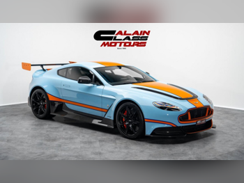 Aston Martin  Vantage  GT 12  2016  Automatic  32 Km  12 Cylinder  Rear Wheel Drive (RWD)  Coupe / Sport  Blue and Brown