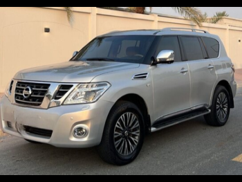 Nissan  Patrol  Platinum  2015  Automatic  190,582 Km  8 Cylinder  Four Wheel Drive (4WD)  SUV  Silver