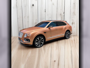 Bentley  Bentayga  2018  Automatic  81,000 Km  12 Cylinder  Four Wheel Drive (4WD)  SUV  Orange