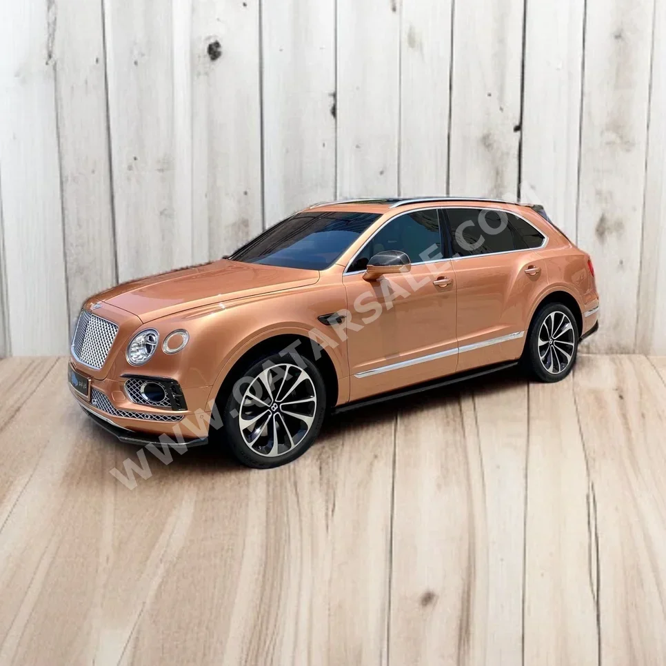 Bentley  Bentayga  2018  Automatic  81,000 Km  12 Cylinder  Four Wheel Drive (4WD)  SUV  Orange