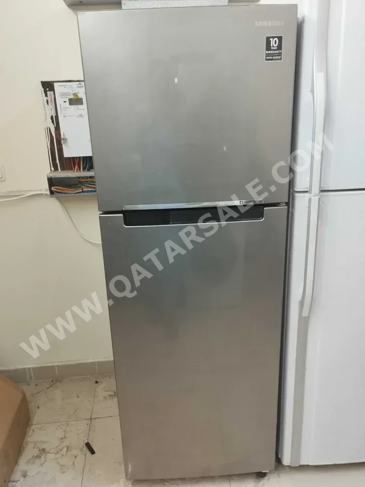 سامسونج  ثلاجة بفريزر علوي  - ستانلس لوك