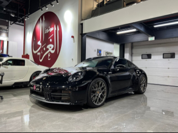 Porsche  911  Carrera  2025  Automatic  4,000 Km  6 Cylinder  Rear Wheel Drive (RWD)  Coupe / Sport  Black  With Warranty
