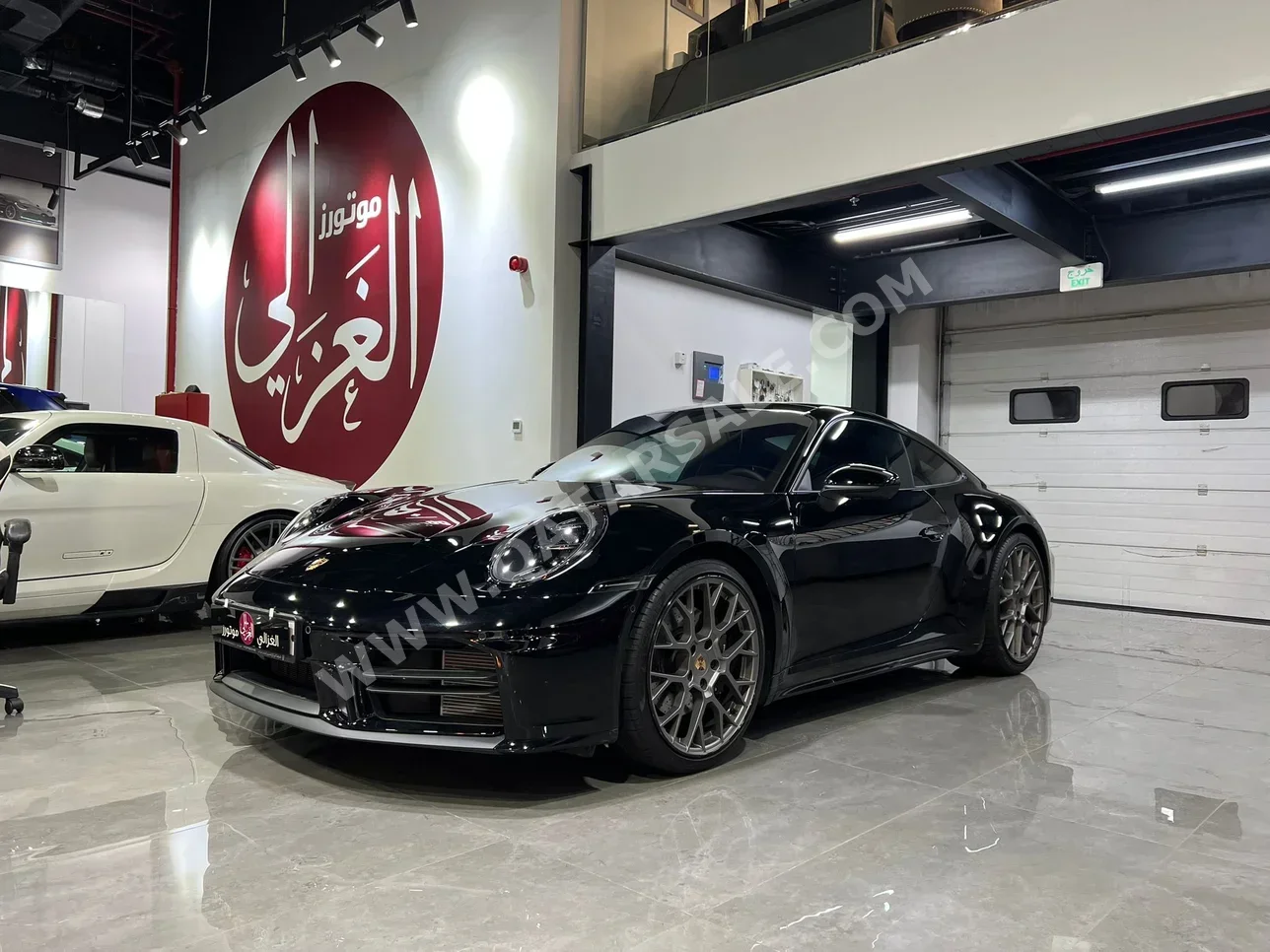 Porsche  911  Carrera  2025  Automatic  4,000 Km  6 Cylinder  Rear Wheel Drive (RWD)  Coupe / Sport  Black  With Warranty