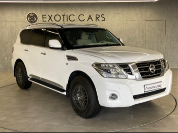 Nissan  Patrol  SE  2013  Automatic  302,000 Km  8 Cylinder  Four Wheel Drive (4WD)  SUV  White