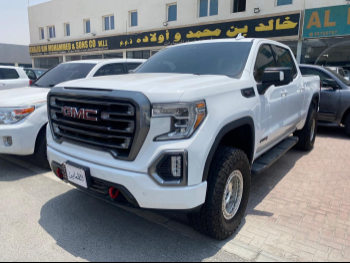 GMC  Sierra  AT4  2021  Automatic  96,000 Km  8 Cylinder  Four Wheel Drive (4WD)  Pick Up  White