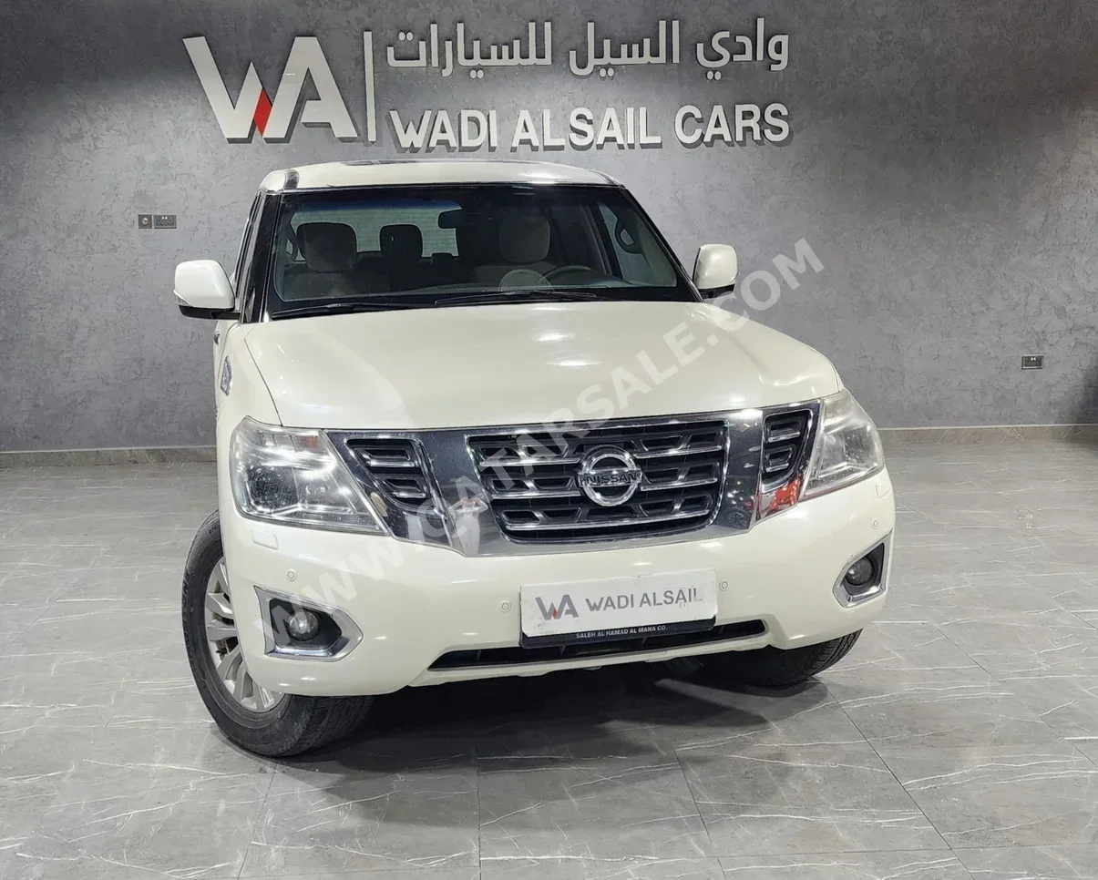 نيسان  باترول  اس اي  2015  اوتوماتيك  163,000 كم  8 سلندر  دفع رباعي  اس يو في  أبيض