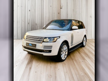 Land Rover  Range Rover  Vogue SE Super charged  2014  Automatic  181,000 Km  8 Cylinder  Four Wheel Drive (4WD)  SUV  White