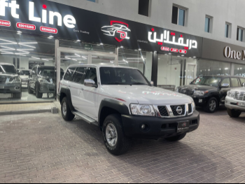 Nissan  Patrol  GL  2019  Automatic  148,000 Km  8 Cylinder  Four Wheel Drive (4WD)  Sedan  White