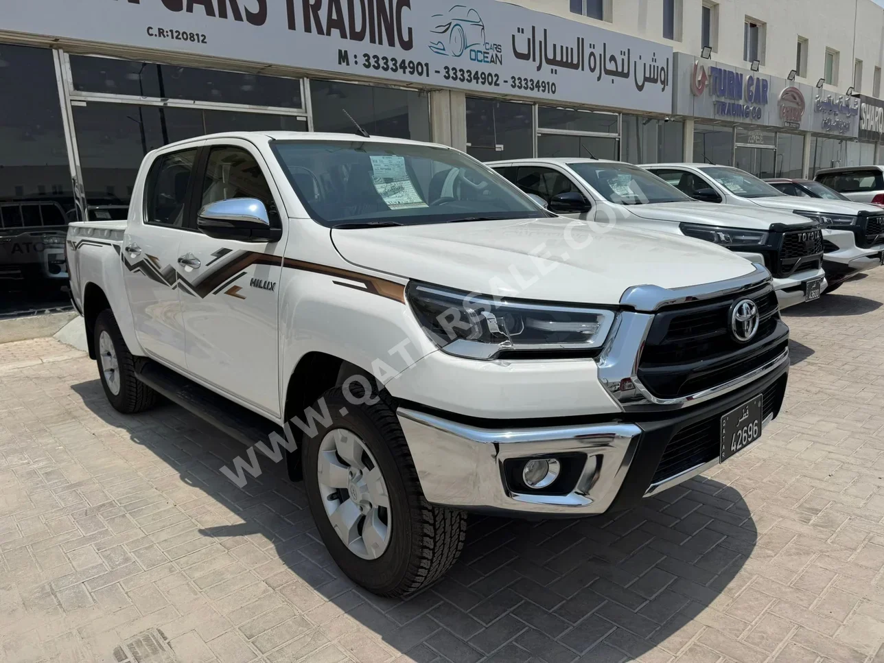 Toyota  Hilux  SR5  2024  Automatic  0 Km  4 Cylinder  Four Wheel Drive (4WD)  Pick Up  White  With Warranty
