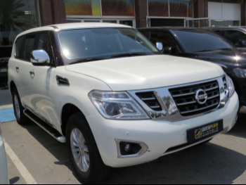 Nissan  Patrol  XE  2019  Automatic  265,000 Km  6 Cylinder  Four Wheel Drive (4WD)  SUV  White