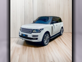 Land Rover  Range Rover  Vogue SE Super charged  2014  Automatic  166,600 Km  8 Cylinder  Four Wheel Drive (4WD)  SUV  White