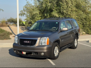 GMC  Yukon  SLE  2013  Automatic  122,700 Km  8 Cylinder  Rear Wheel Drive (RWD)  SUV  Brown