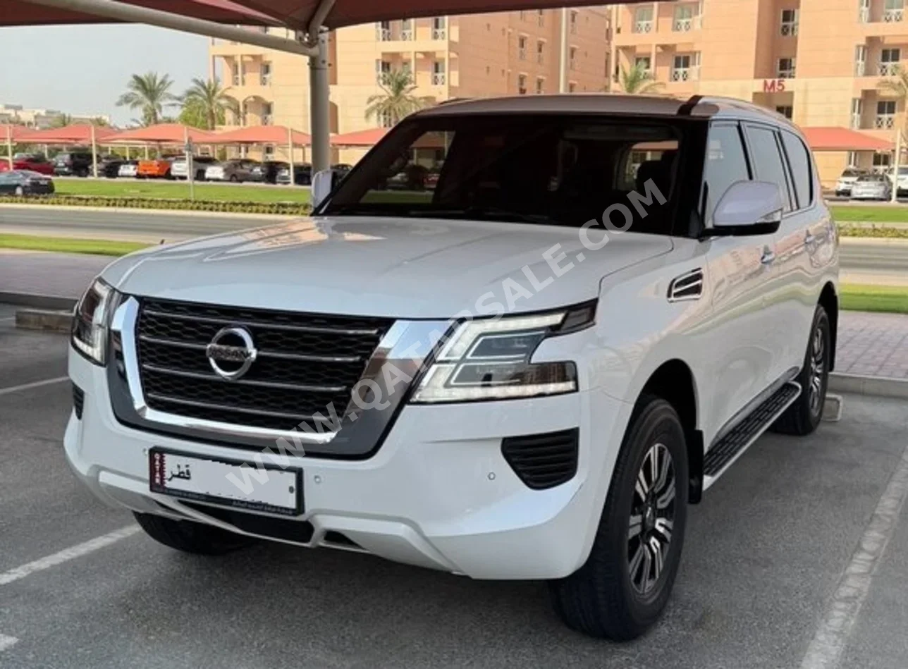 Nissan  Patrol  XE  2020  Automatic  36,000 Km  6 Cylinder  Four Wheel Drive (4WD)  SUV  White  With Warranty