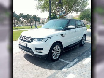 Land Rover  Range Rover  Sport HSE  2015  Automatic  164,000 Km  6 Cylinder  Four Wheel Drive (4WD)  SUV  White