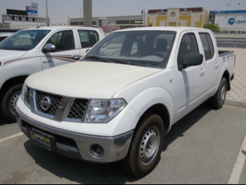 Nissan  Navara  2014  Manual  395,000 Km  4 Cylinder  Rear Wheel Drive (RWD)  Pick Up  White