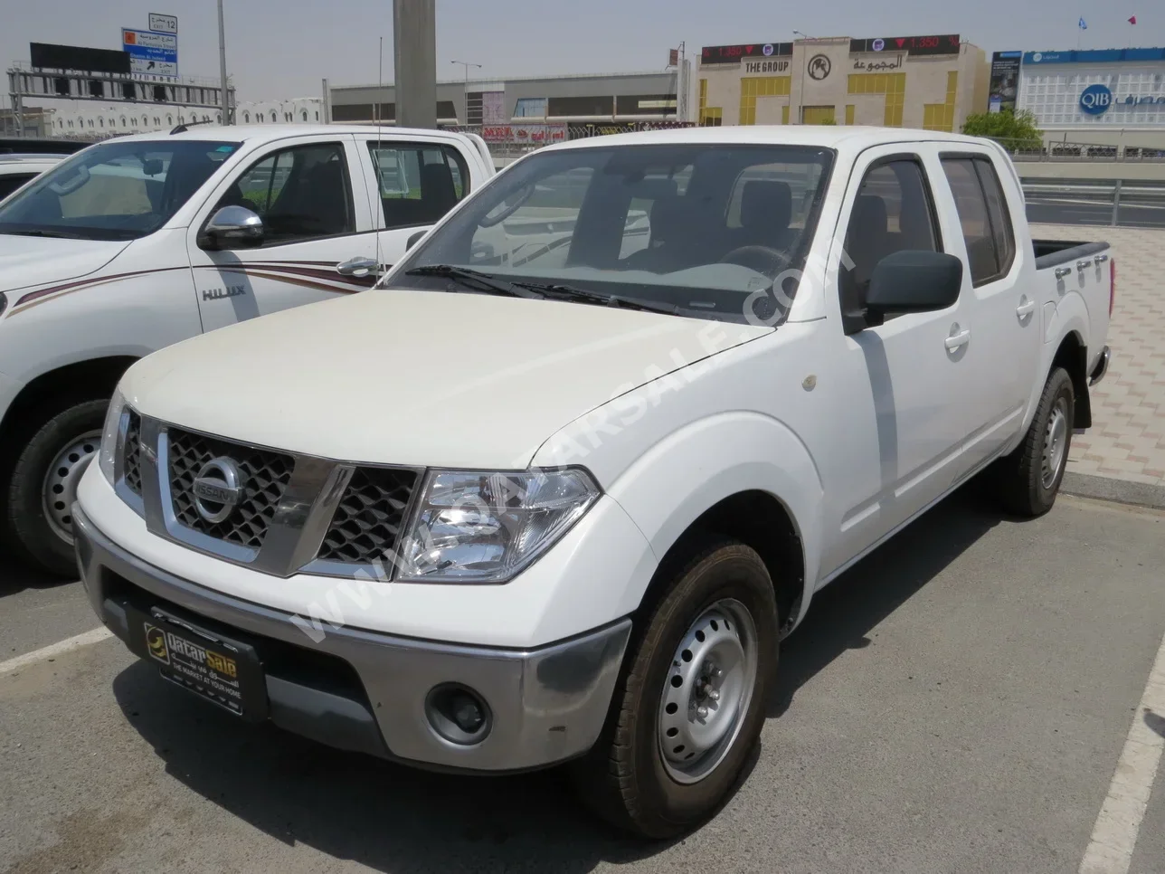 Nissan  Navara  2014  Manual  395,000 Km  4 Cylinder  Rear Wheel Drive (RWD)  Pick Up  White