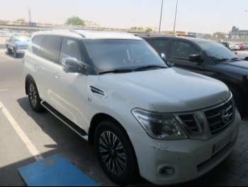 Nissan  Patrol  Platinum  2016  Automatic  248,000 Km  8 Cylinder  Four Wheel Drive (4WD)  SUV  White