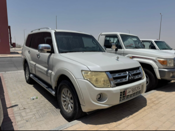 Mitsubishi  Pajero  GLS  2013  Automatic  258,000 Km  6 Cylinder  Four Wheel Drive (4WD)  SUV  White