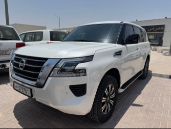 Nissan  Patrol  XE  2021  Automatic  152,000 Km  6 Cylinder  Four Wheel Drive (4WD)  SUV  White