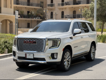 GMC  Yukon  Denali  2023  Automatic  79,000 Km  8 Cylinder  Four Wheel Drive (4WD)  SUV  White  With Warranty