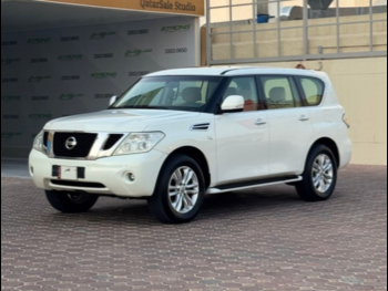 Nissan  Patrol  SE  2013  Automatic  284,000 Km  8 Cylinder  Four Wheel Drive (4WD)  SUV  White
