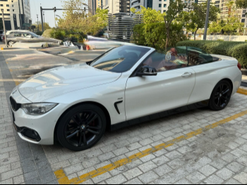 BMW  4-Series  428 I  2016  Automatic  72,300 Km  4 Cylinder  Rear Wheel Drive (RWD)  Convertible  White