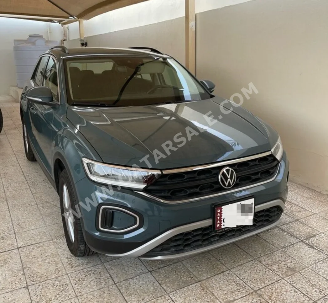Volkswagen  T-Roc  2024  Automatic  11,000 Km  4 Cylinder  Four Wheel Drive (4WD)  SUV  Dark Blue  With Warranty