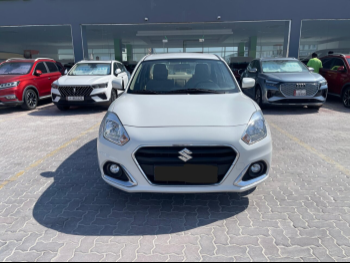Suzuki  Dzire  2023  Automatic  64,000 Km  4 Cylinder  Front Wheel Drive (FWD)  Sedan  White