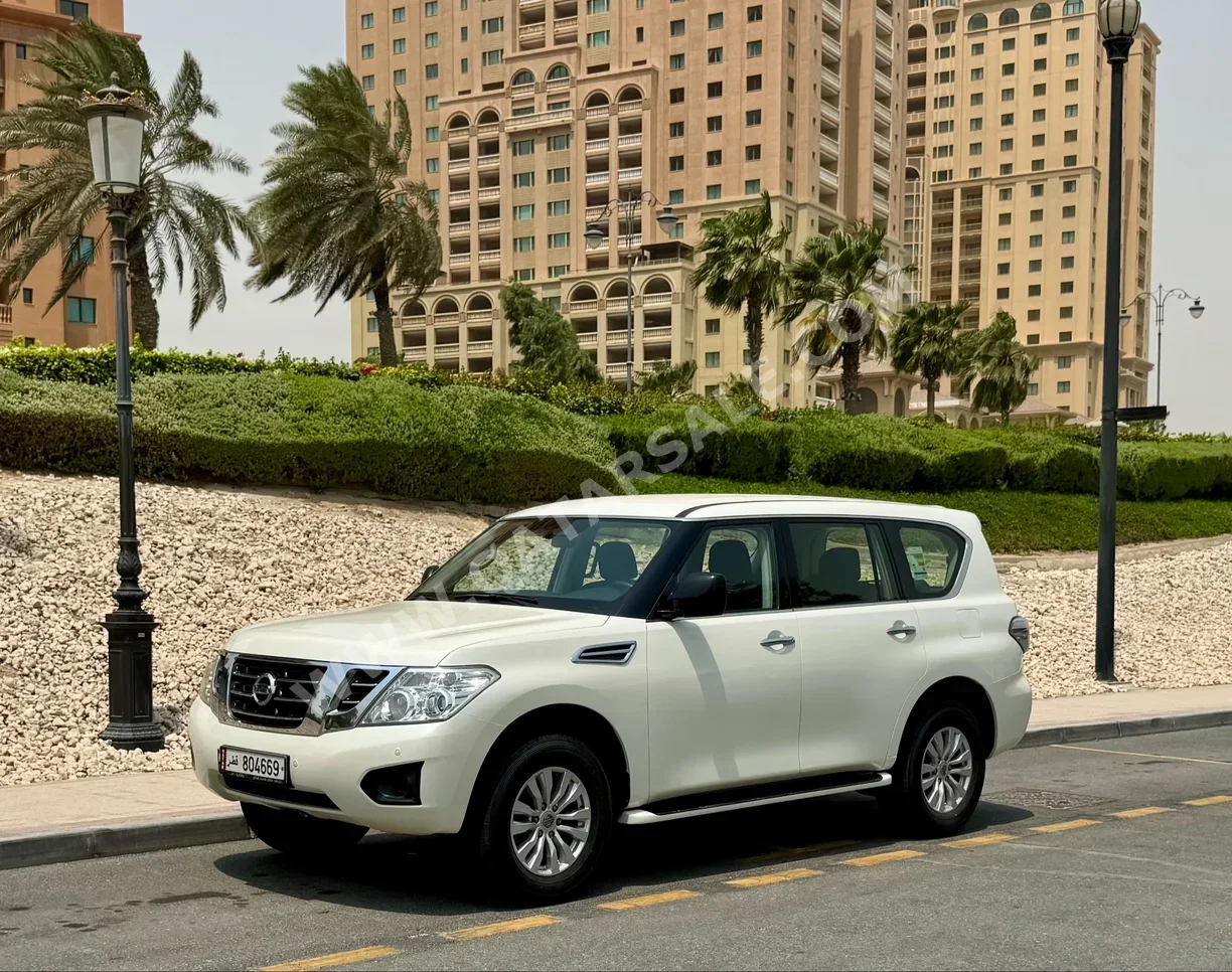 Nissan  Patrol  XE  2019  Automatic  99,800 Km  6 Cylinder  Four Wheel Drive (4WD)  SUV  White