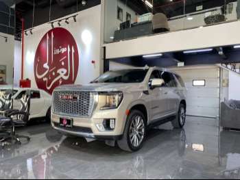 GMC  Yukon  Denali  2023  Automatic  72,000 Km  8 Cylinder  Four Wheel Drive (4WD)  SUV  Gold  With Warranty
