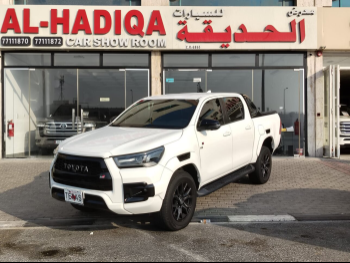 Toyota  Hilux  GR Sport  2022  Automatic  117,000 Km  6 Cylinder  Four Wheel Drive (4WD)  Pick Up  White