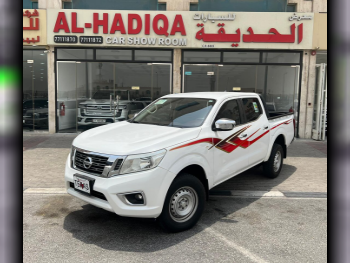 Nissan  Navara  SE  2020  Automatic  60,000 Km  4 Cylinder  Rear Wheel Drive (RWD)  Pick Up  White
