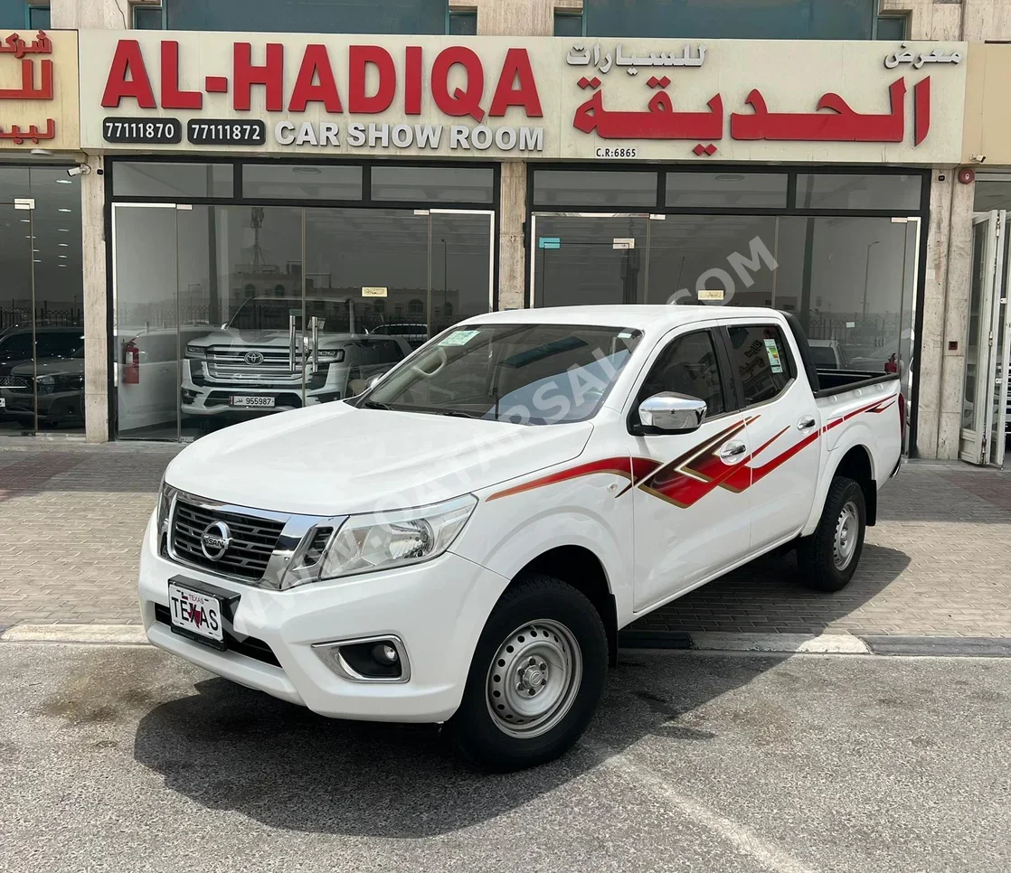 Nissan  Navara  SE  2020  Automatic  60,000 Km  4 Cylinder  Rear Wheel Drive (RWD)  Pick Up  White